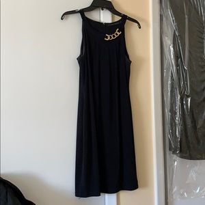 Ivanka Trump navy blue sleeveless dress